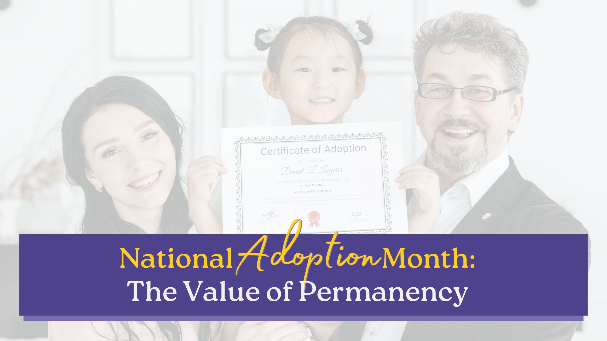 A smiling family holds a certificate of adoption together, celebrating National Adoption Month and highlighting the importance of permanency.
