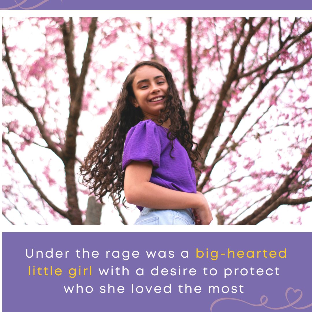 A smiling girl stands in front of blooming trees, symbolizing healing and resilience in a child who has experienced food trauma.